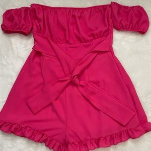 pink romper, never worn size large from fashion nova
